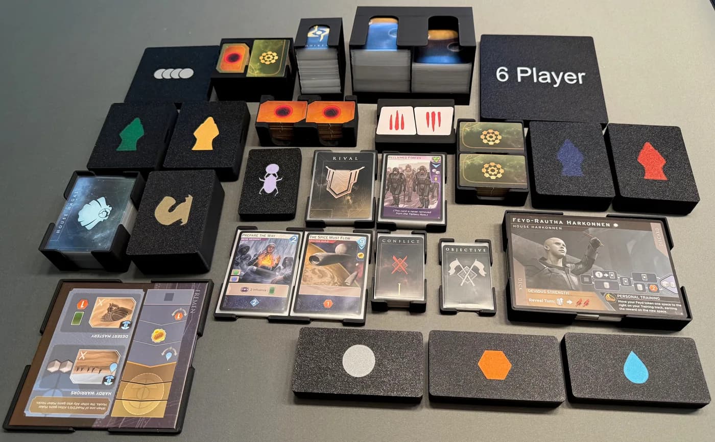 Complete Dune Imperium Uprising organizer with trays for players, cards, and resources