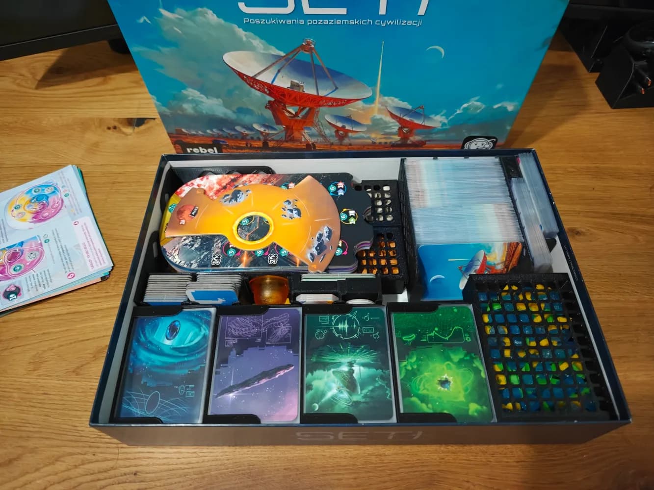 SETI box with cards, tokens, and components arranged in 3D-printed trays