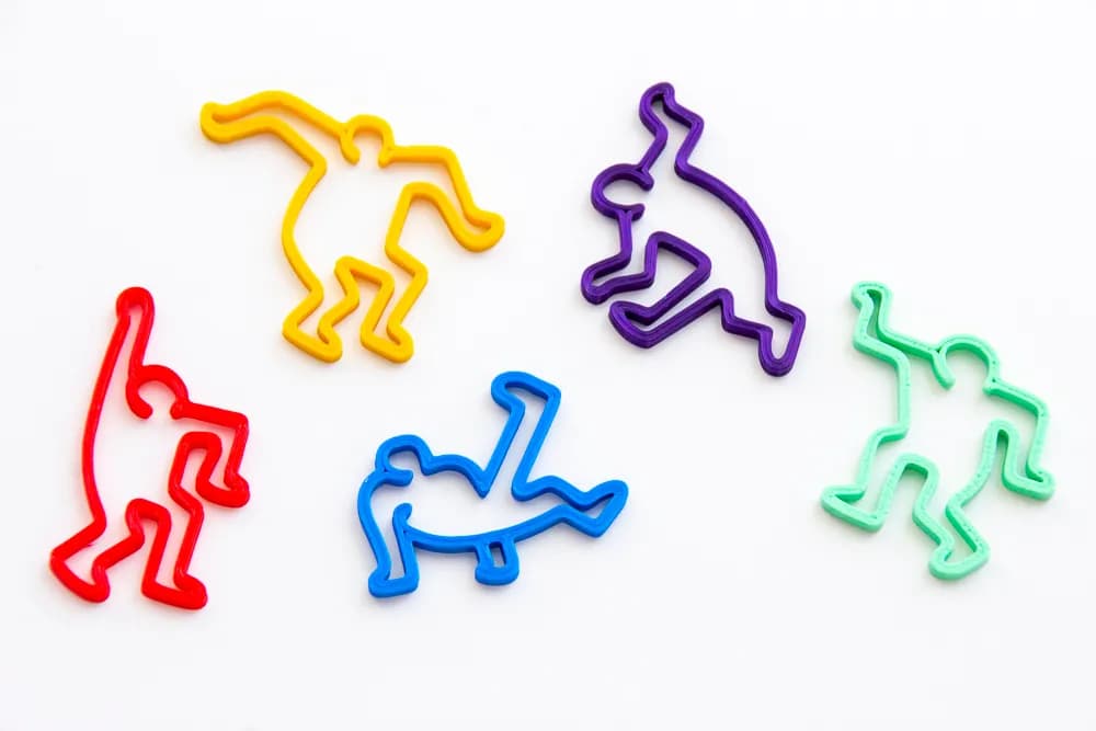 Keith Haring-Style Dancing Figure Keychains - Image 1